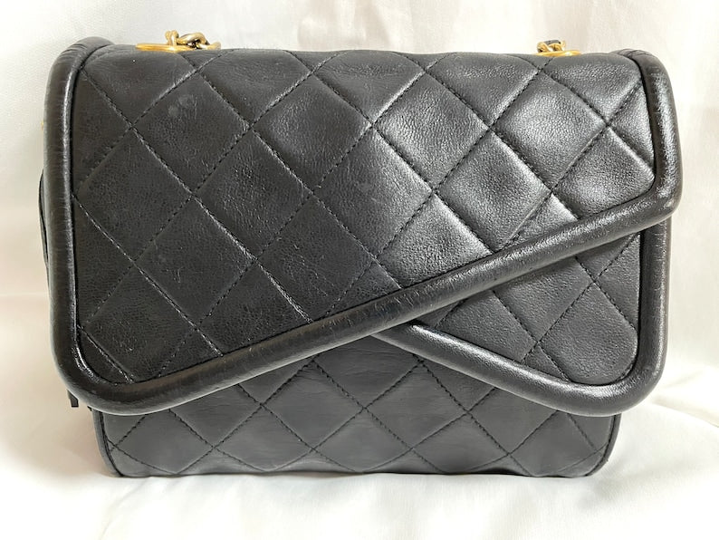 Luxury Chanel Vintage black fringe camera bag with double flaps