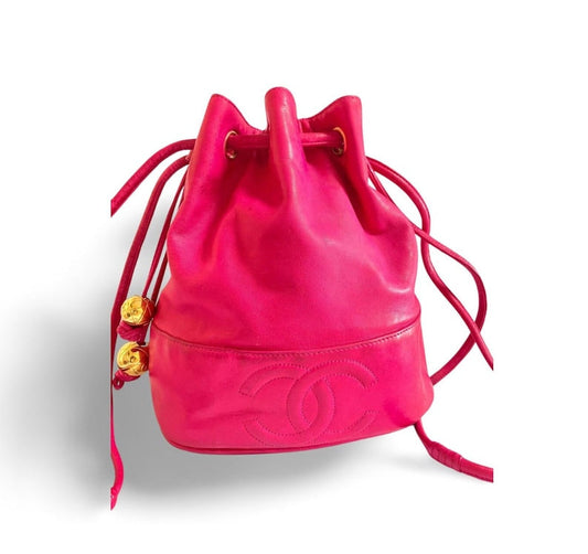 Luxury Chanel Vintage fusia pink lambskin hobo bucket shoulder bag with CC golden balls and CC stitch mark