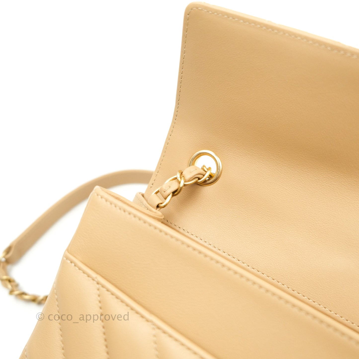 Chanel Quilted Chevron In The City Bag Beige Calfskin Aged Gold Hardware
