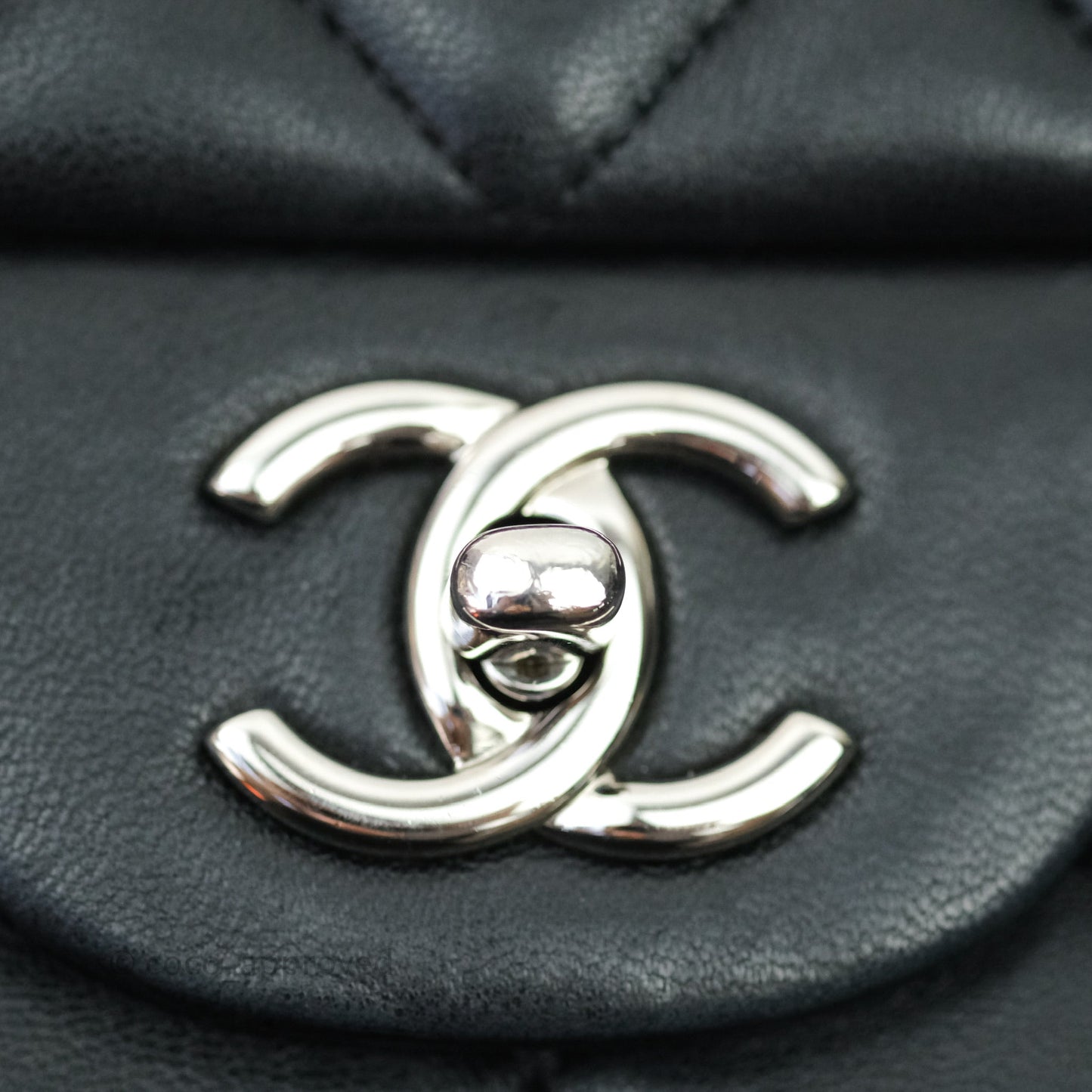 Chanel Quilted Maxi Single Flap Black Lambskin Silver Hardware