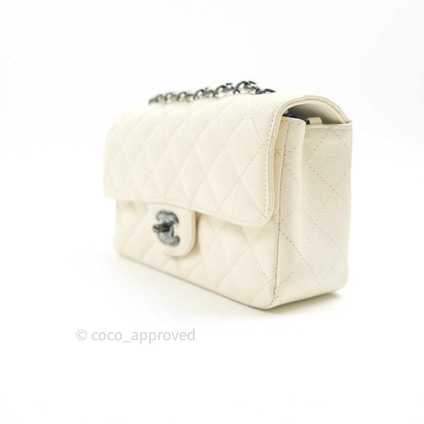 Chanel Quilted Mini Rectangular Flap Ivory Grained Calfskin Black Hardware