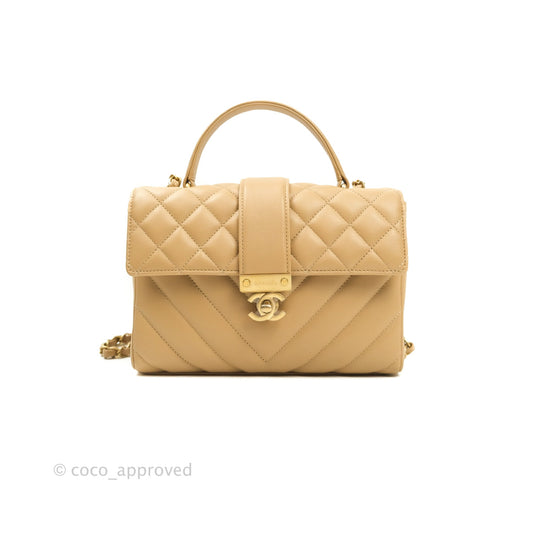 Chanel Quilted Chevron In The City Bag Beige Calfskin Aged Gold Hardware