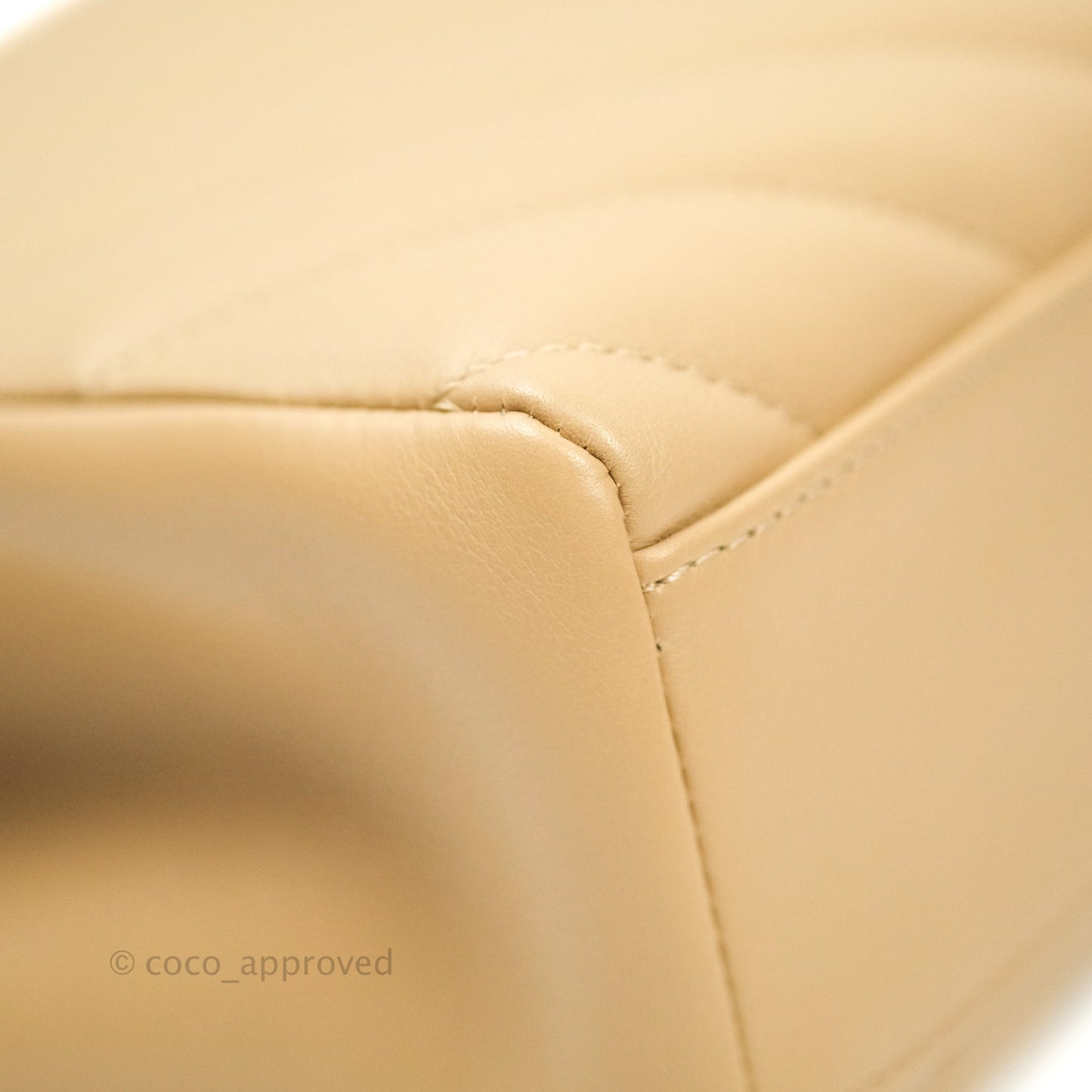Chanel Quilted Chevron In The City Bag Beige Calfskin Aged Gold Hardware