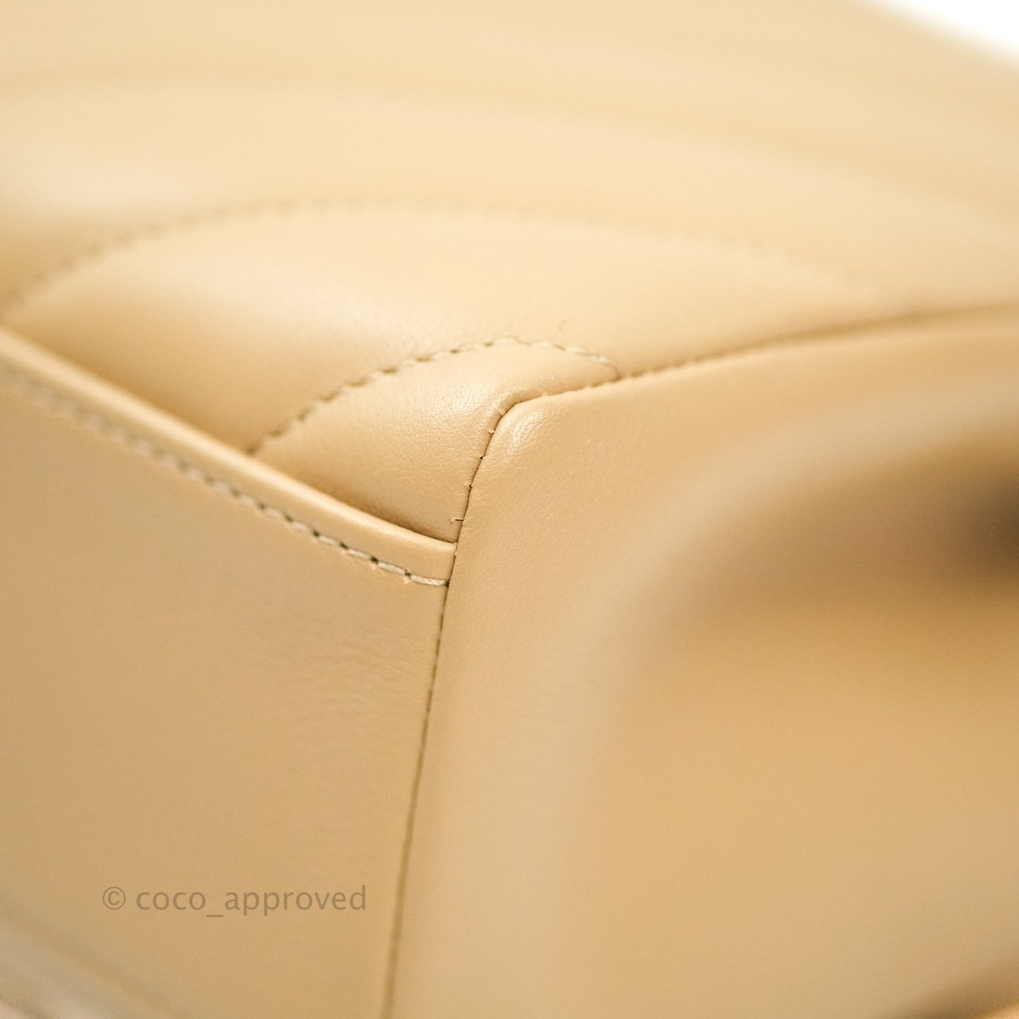 Chanel Quilted Chevron In The City Bag Beige Calfskin Aged Gold Hardware