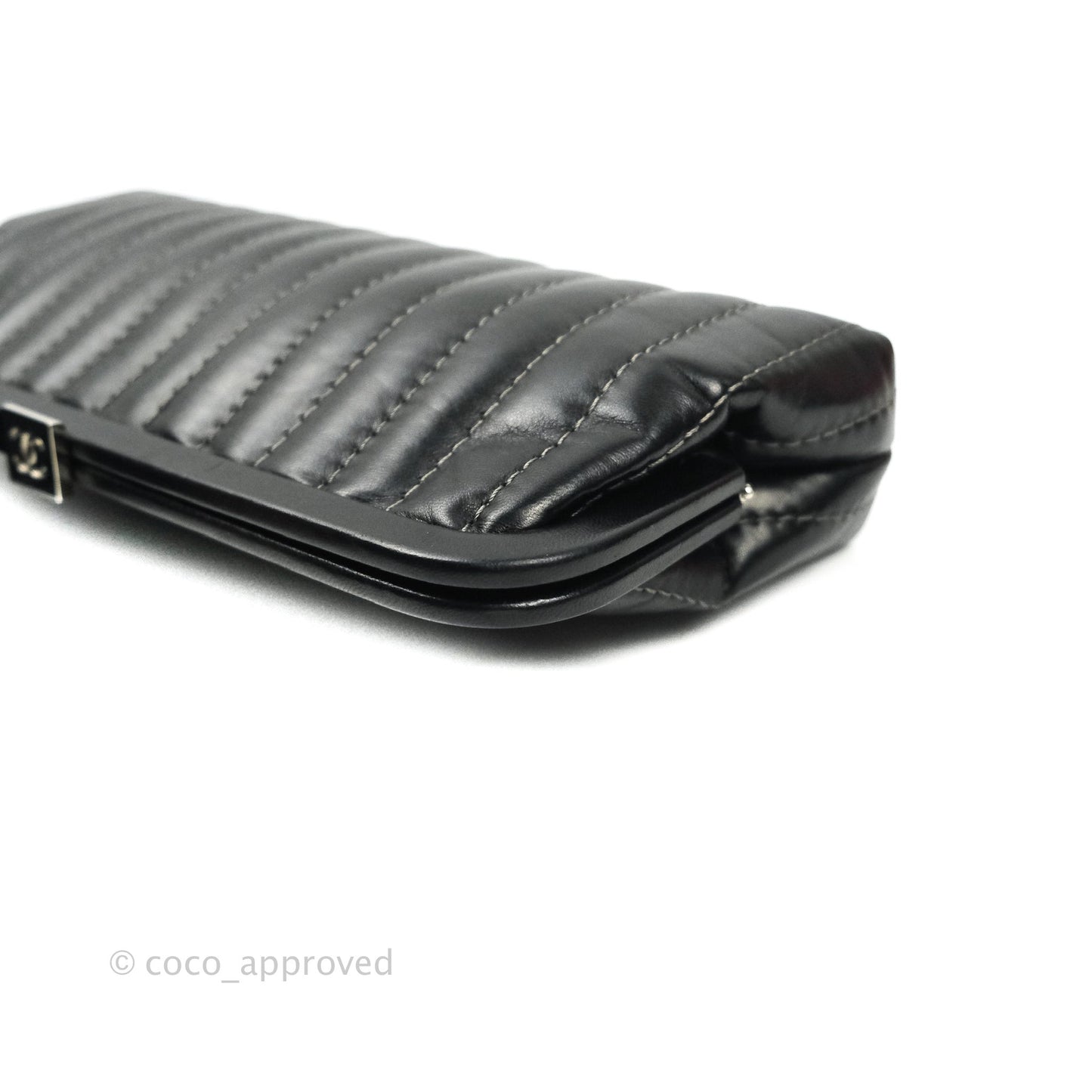 Chanel Vertical Stitch Kiss Lock Black Lambskin Clutch Silver Hardware