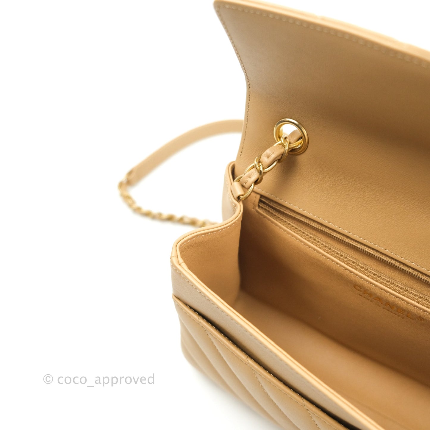 Chanel Quilted Chevron In The City Bag Beige Calfskin Aged Gold Hardware