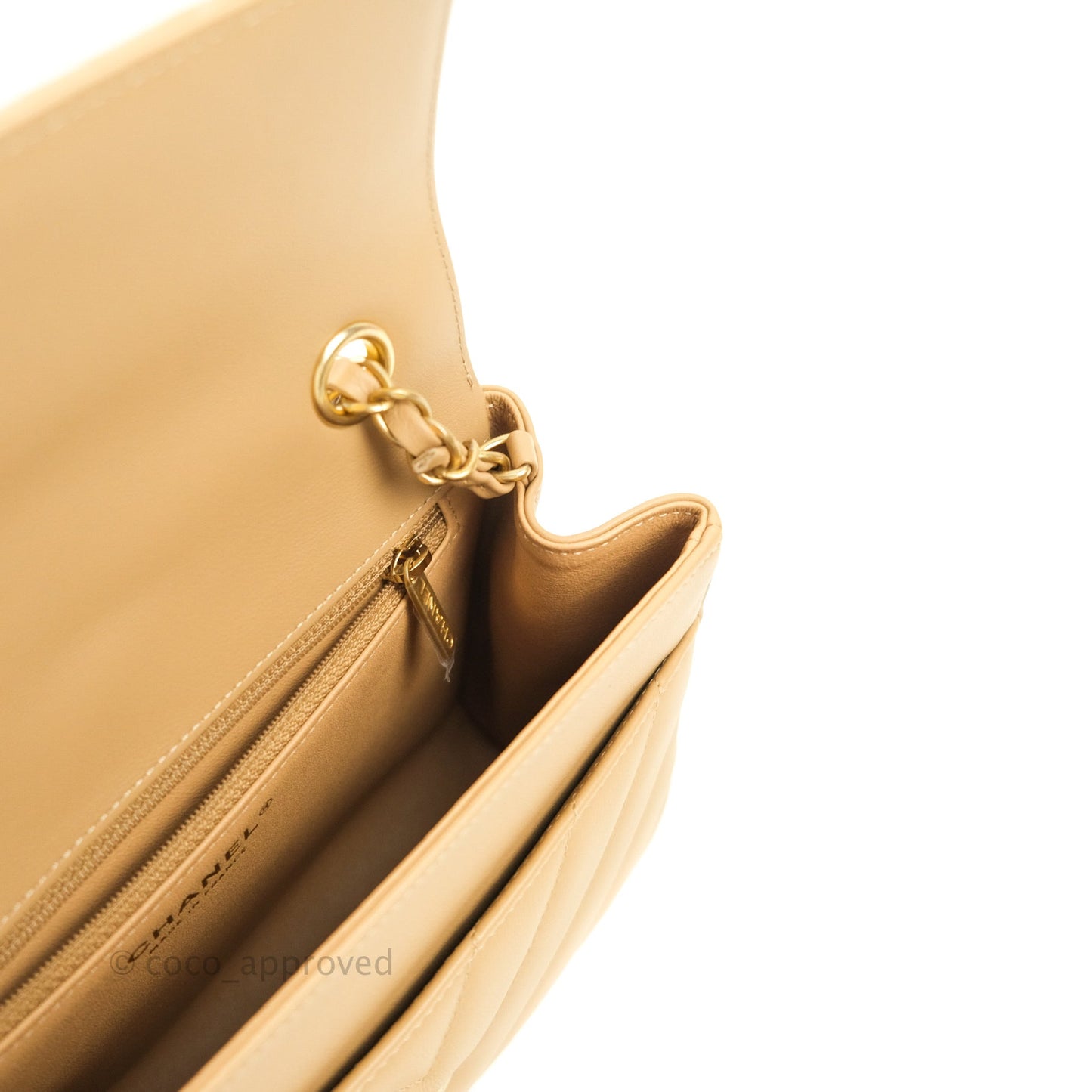 Chanel Quilted Chevron In The City Bag Beige Calfskin Aged Gold Hardware