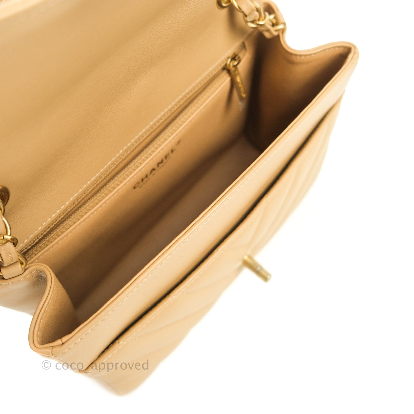 Chanel Quilted Chevron In The City Bag Beige Calfskin Aged Gold Hardware