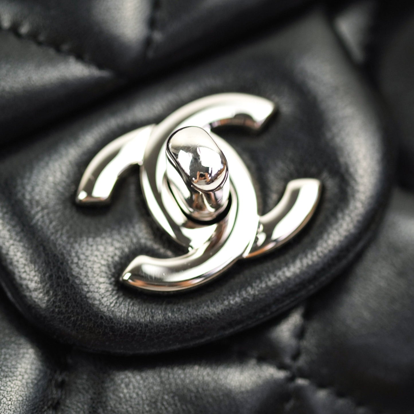 Chanel Quilted Clutch with Chain Black Lambskin Silver Hardware