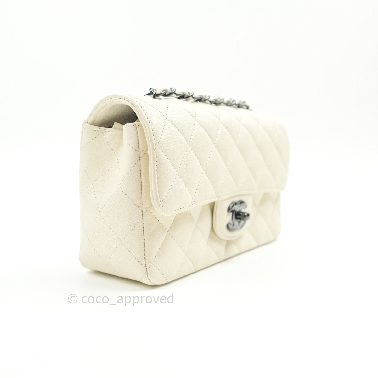 Chanel Quilted Mini Rectangular Flap Ivory Grained Calfskin Black Hardware