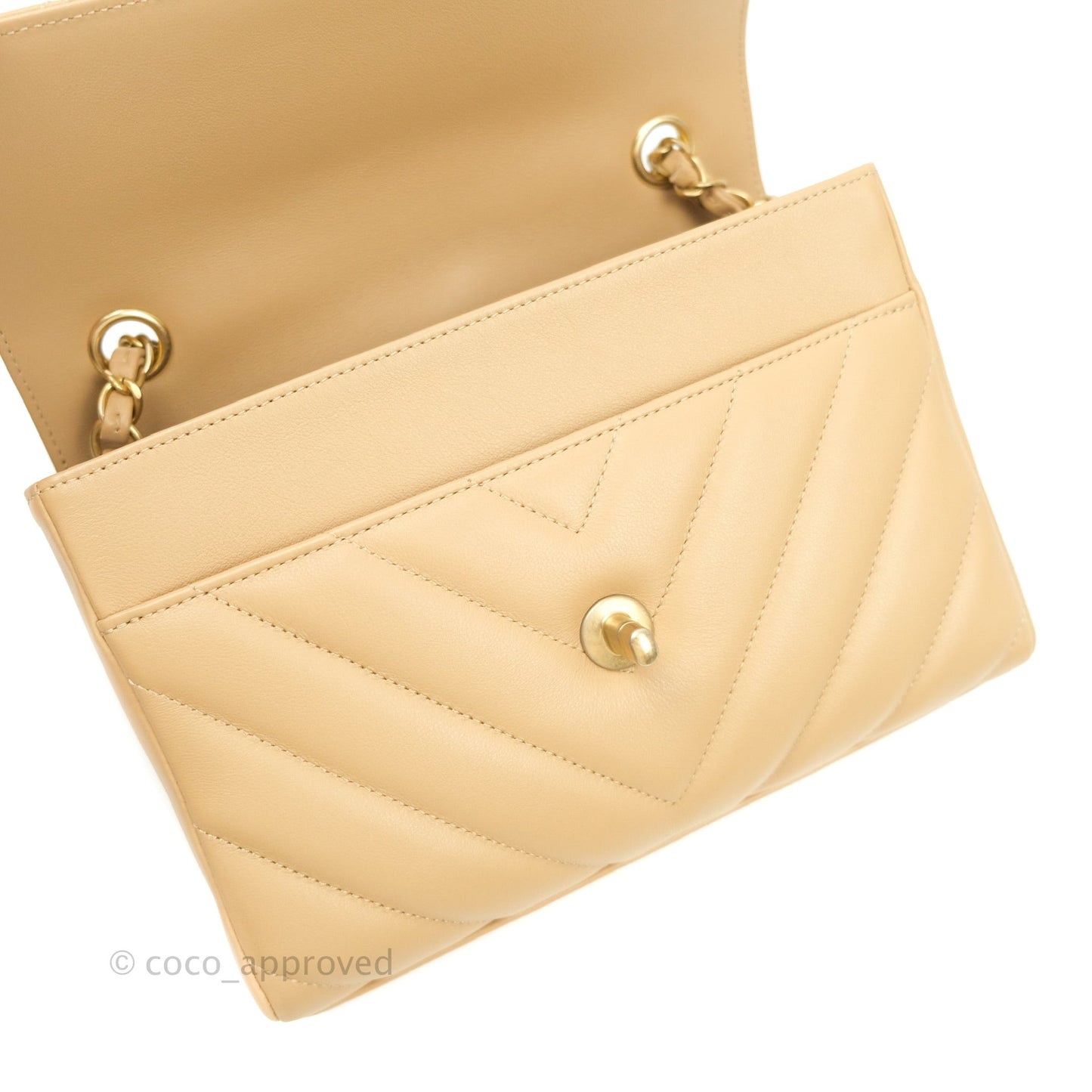 Chanel Quilted Chevron In The City Bag Beige Calfskin Aged Gold Hardware