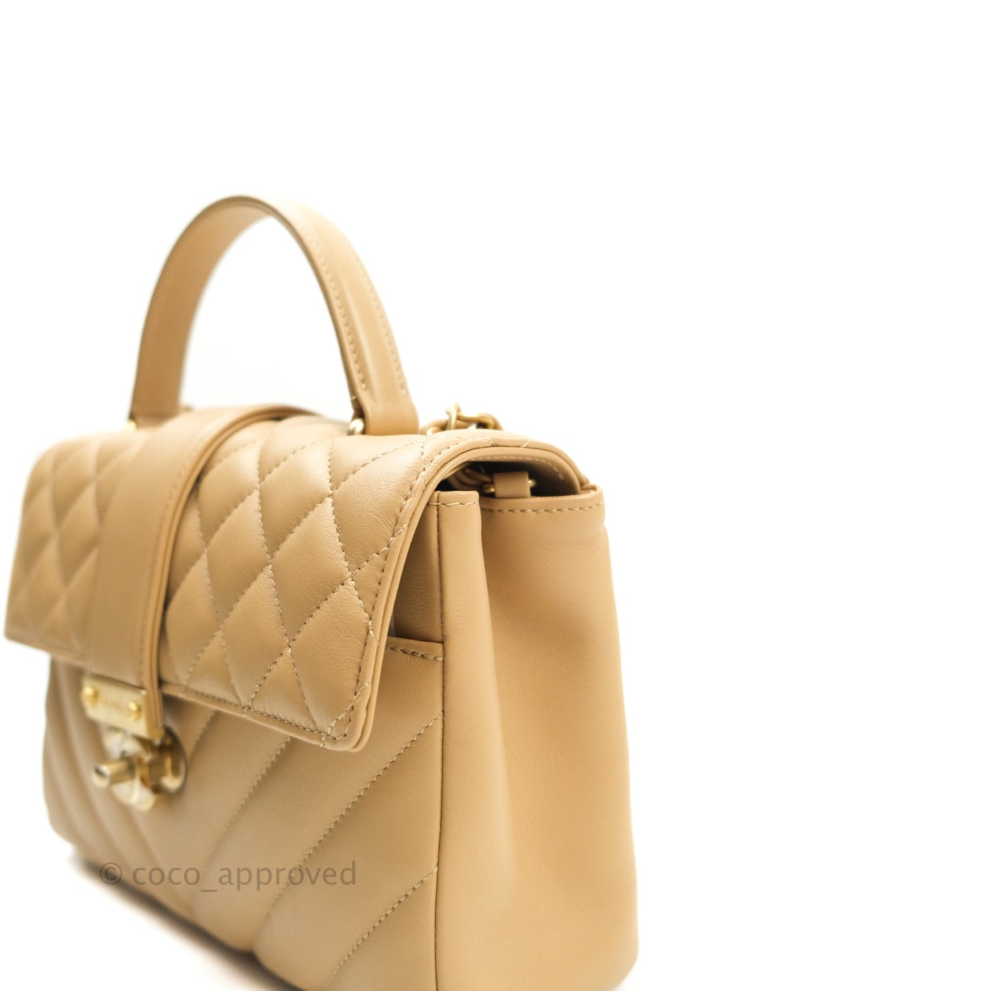 Chanel Quilted Chevron In The City Bag Beige Calfskin Aged Gold Hardware