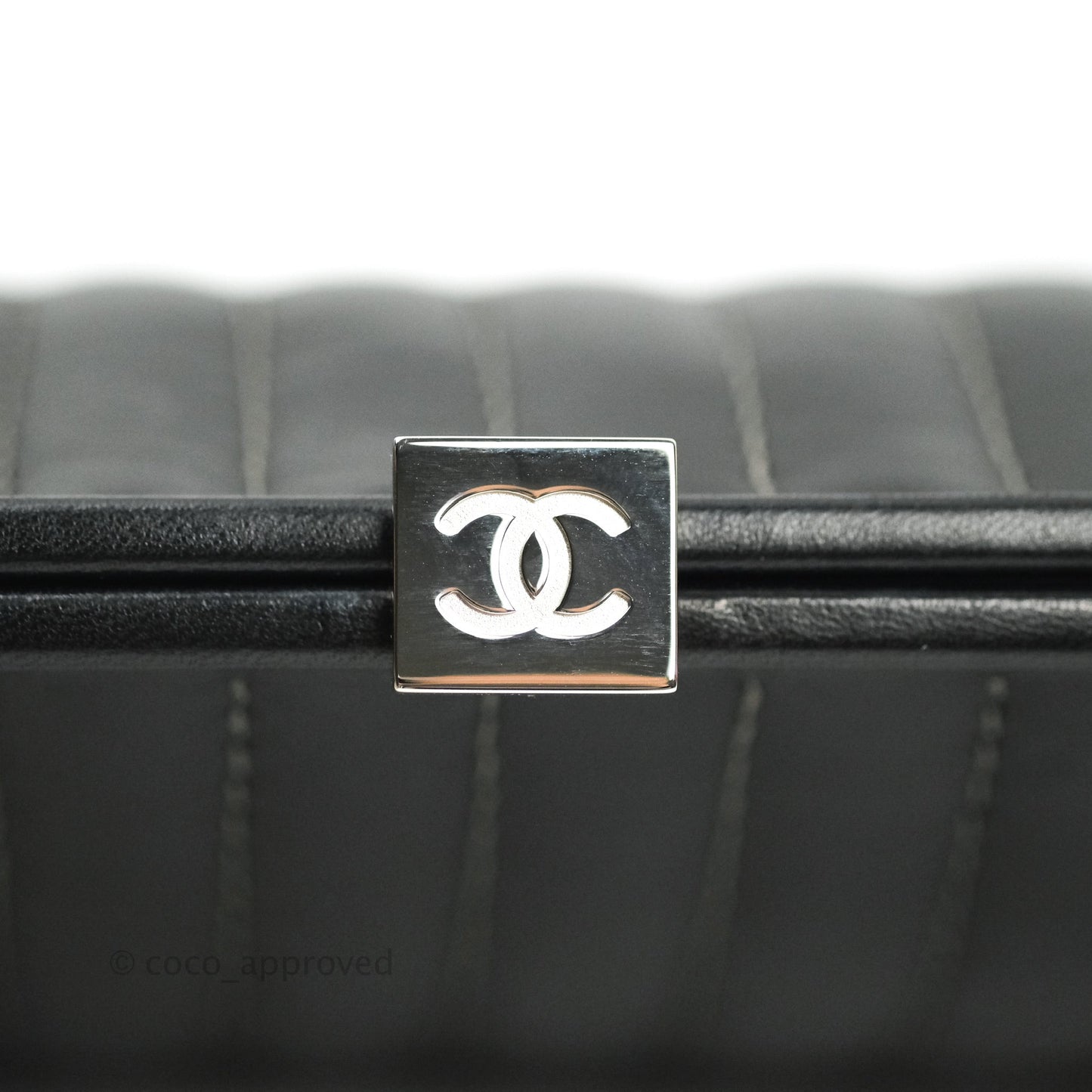 Chanel Vertical Stitch Kiss Lock Black Lambskin Clutch Silver Hardware