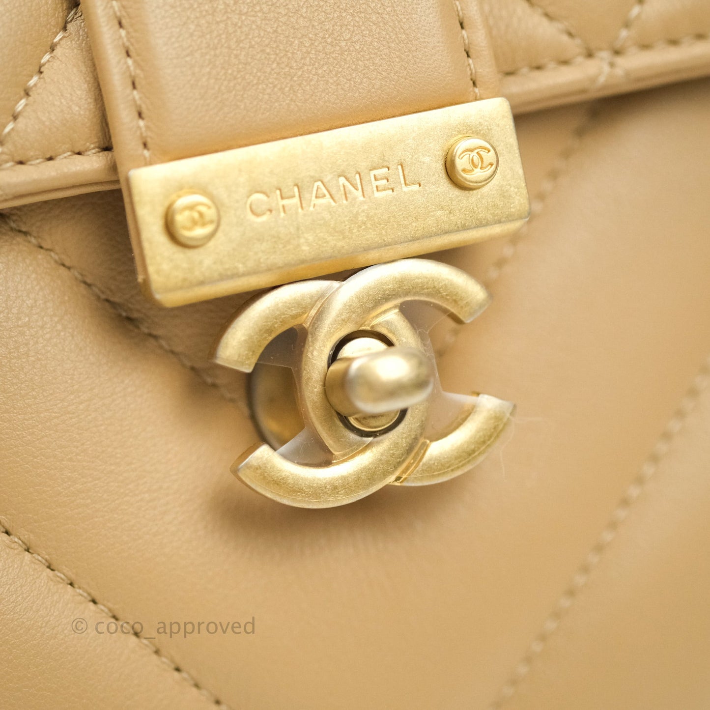 Chanel Quilted Chevron In The City Bag Beige Calfskin Aged Gold Hardware