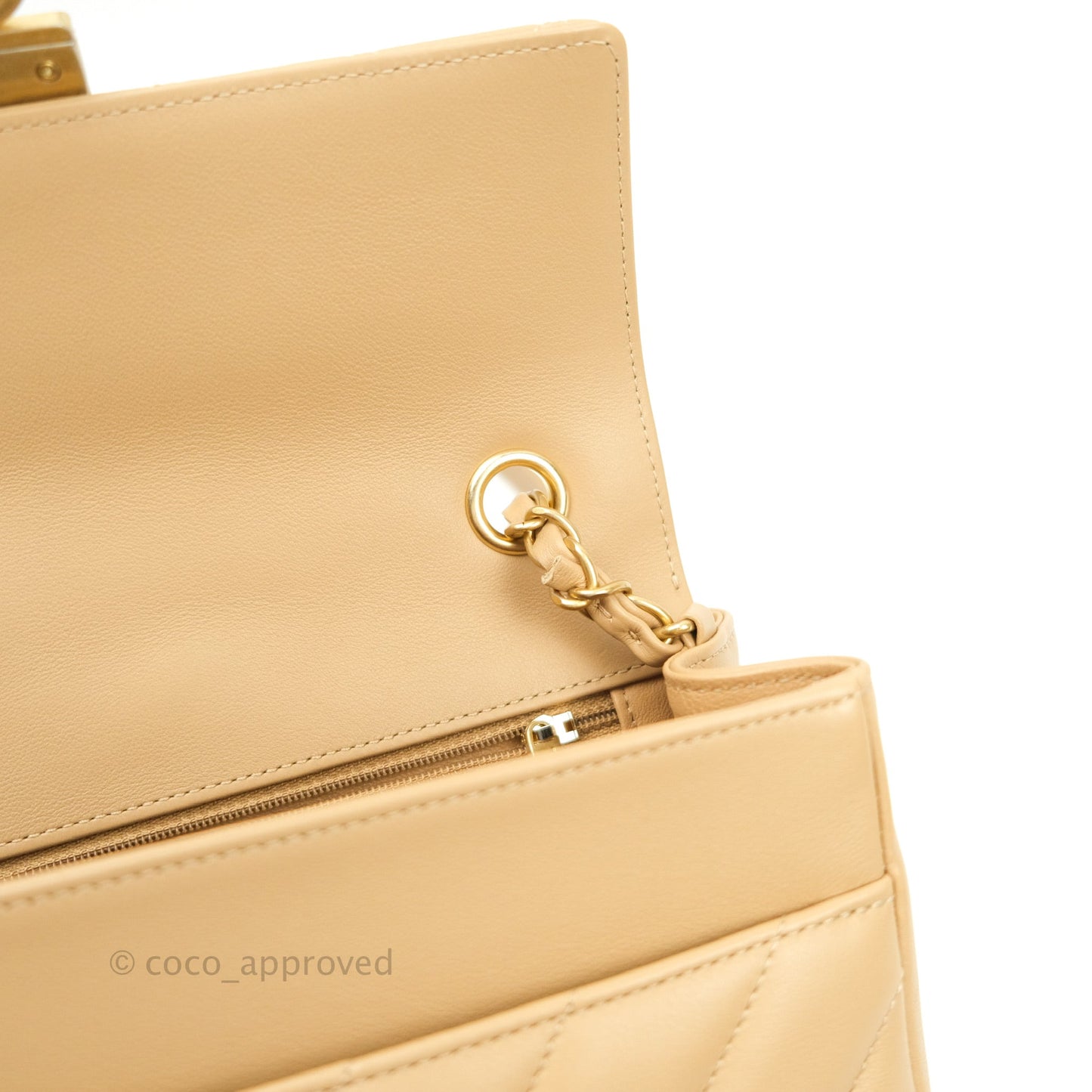 Chanel Quilted Chevron In The City Bag Beige Calfskin Aged Gold Hardware