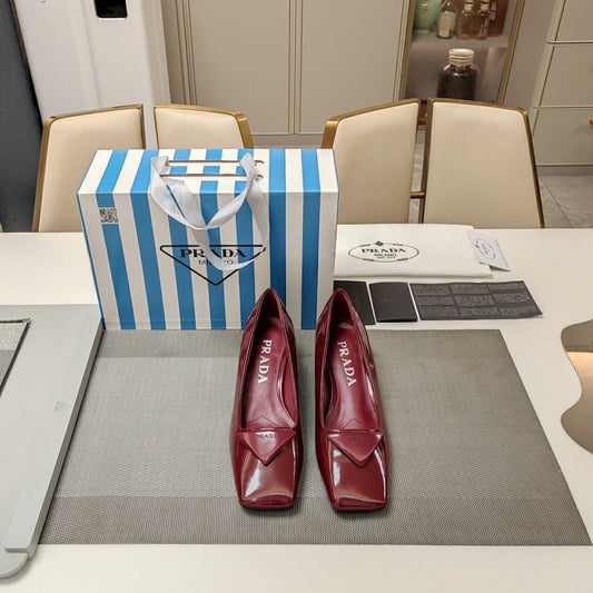 Luxury PradaTRIANGLE LOGO PUMPS IN CURRANT RED GLOSSY CALFSKIN