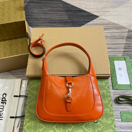 Luxury Gucci JACKIE SMALL SHOULDER BAG 27 IN ORANGE CRACKED LACQUER CALFSKIN GOLD HARDWARE