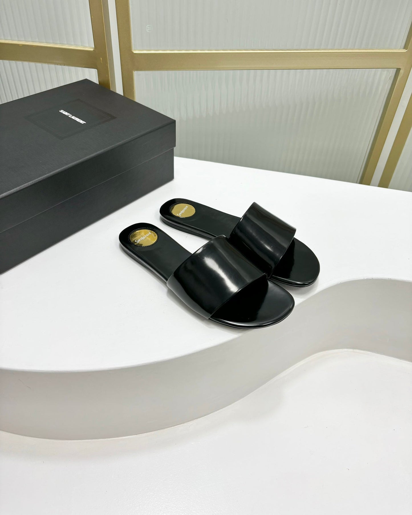 Luxury Saint Laurent CARLYLE SLIDES IN BLACK GLAZED LEATHER