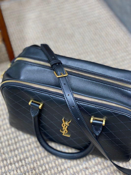 Luxury Saint Laurent SMALL TRAVEL BAG 31 IN BLACK QUILTED LAMBSKIN GOLD HARDWARE