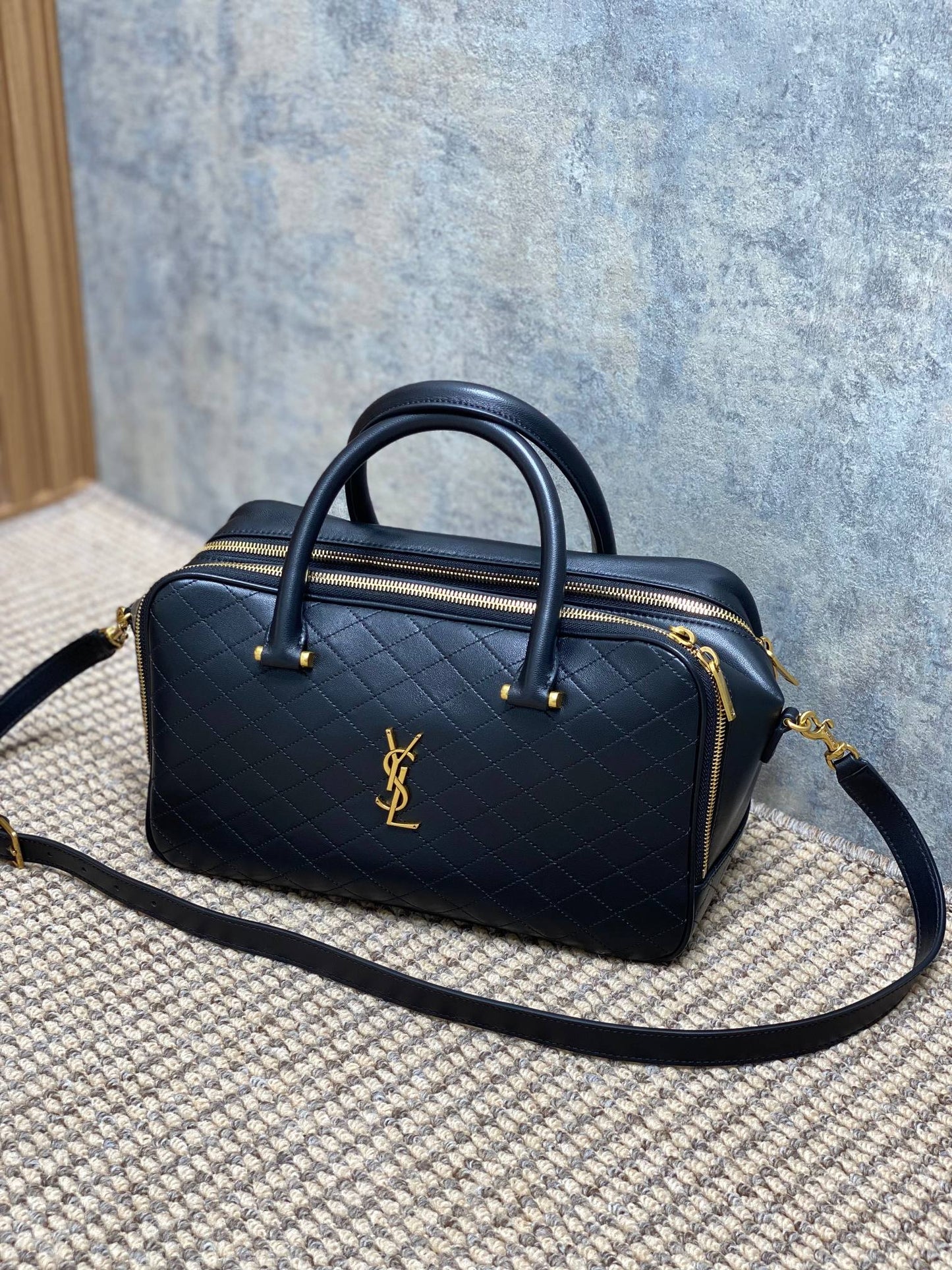 Luxury Saint Laurent SMALL TRAVEL BAG 31 IN BLACK QUILTED LAMBSKIN GOLD HARDWARE