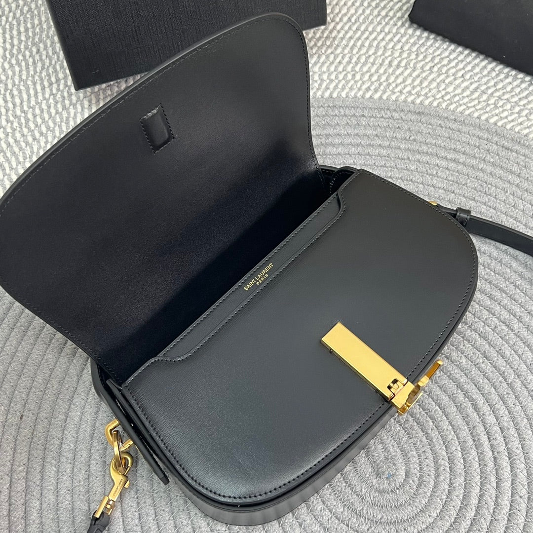 Luxury Saint Laurent VOLTAIRE 24 IN BLACK CALFSKIN GOLD LOGO