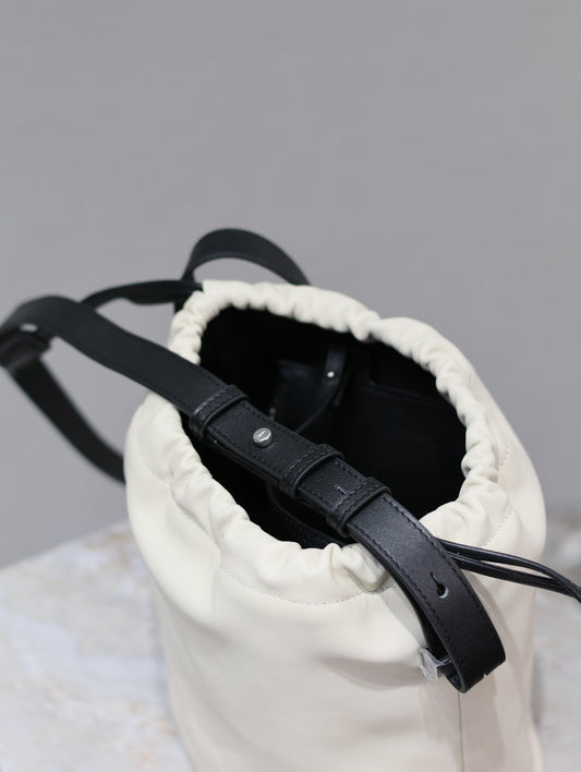 Luxury Saint Laurent RIVE GAUCHE BUCKET BAG 23 IN WHITE CALFSKIN