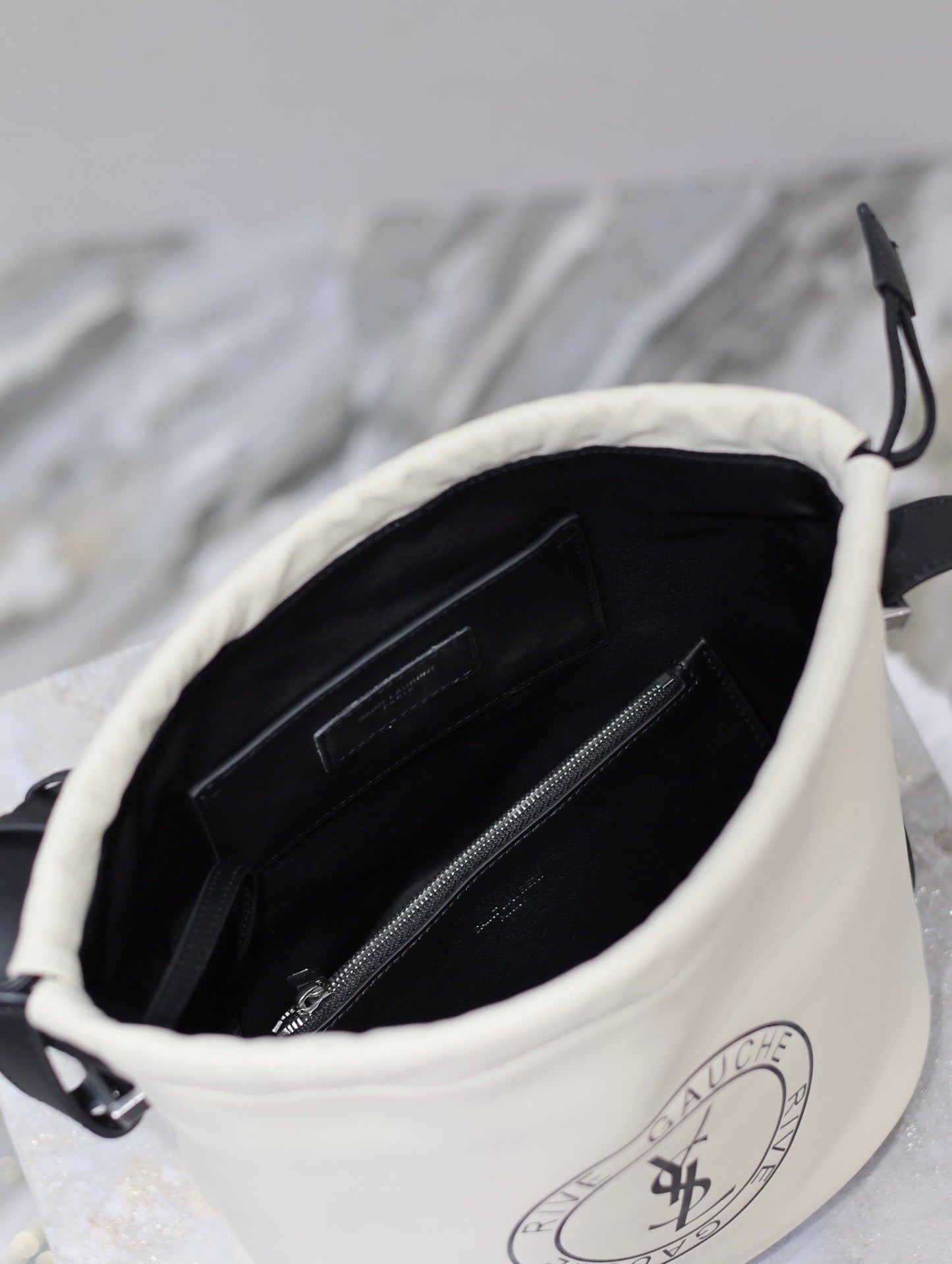 Luxury Saint Laurent RIVE GAUCHE BUCKET BAG 23 IN WHITE CALFSKIN