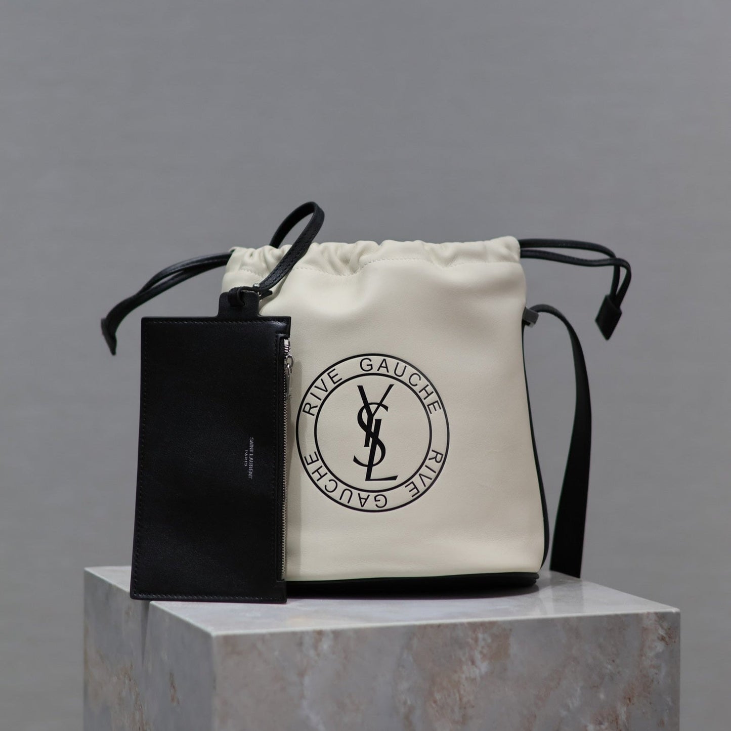 Luxury Saint Laurent RIVE GAUCHE BUCKET BAG 23 IN WHITE CALFSKIN