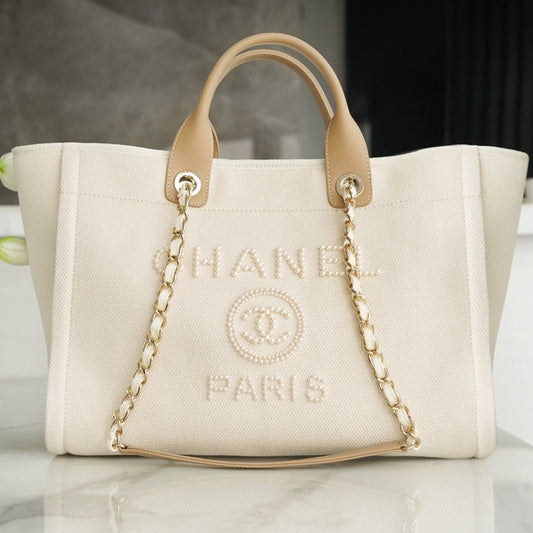 Luxury Chanel LARGE TOTE 39 LIGHT BEIGE CANVAS PEARL LOGO