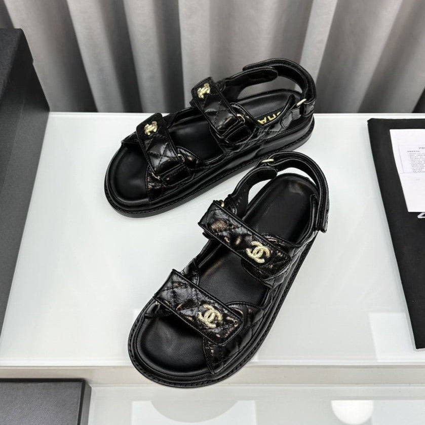 Luxury Chanel dad sandals black patent lambskin
