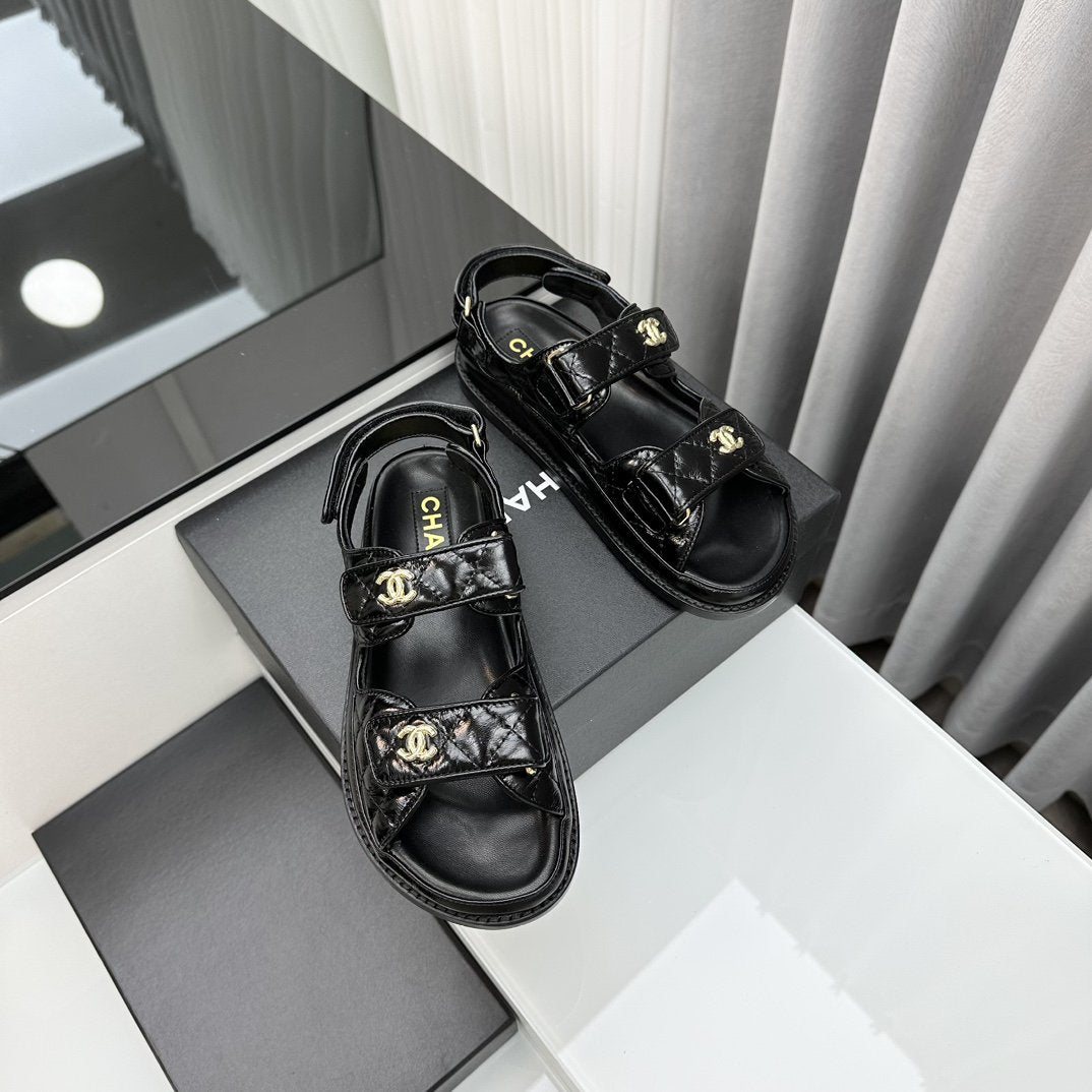 Luxury Chanel dad sandals black patent lambskin