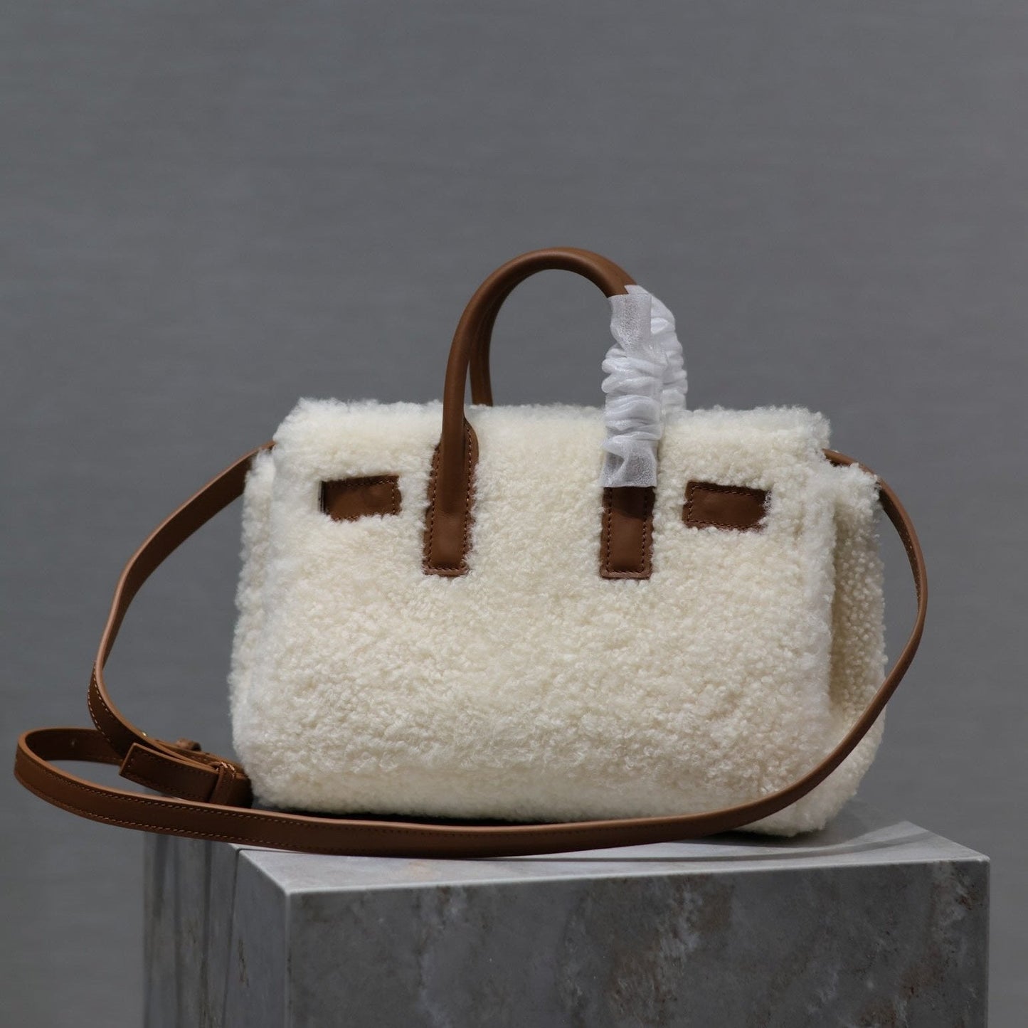 Luxury Saint Laurent SAC DE JOUR 22 IN WHITE SHEARLING AND BROWN CALFSKIN TRIM