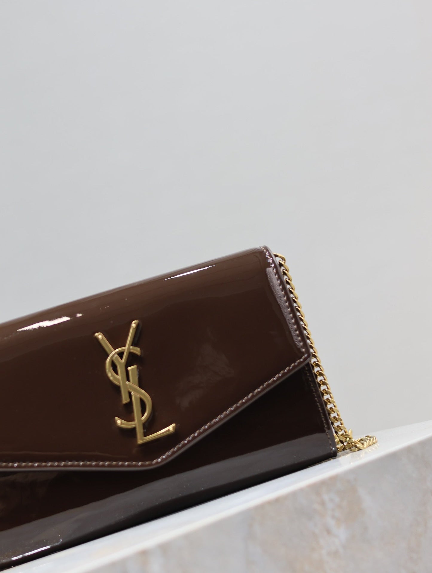 Luxury Saint Laurent uptown chain wallet 19cm dark brown patent calfskin