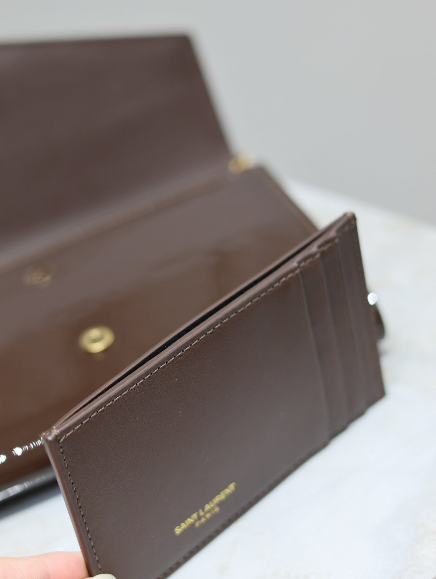 Luxury Saint Laurent uptown chain wallet 19cm dark brown patent calfskin