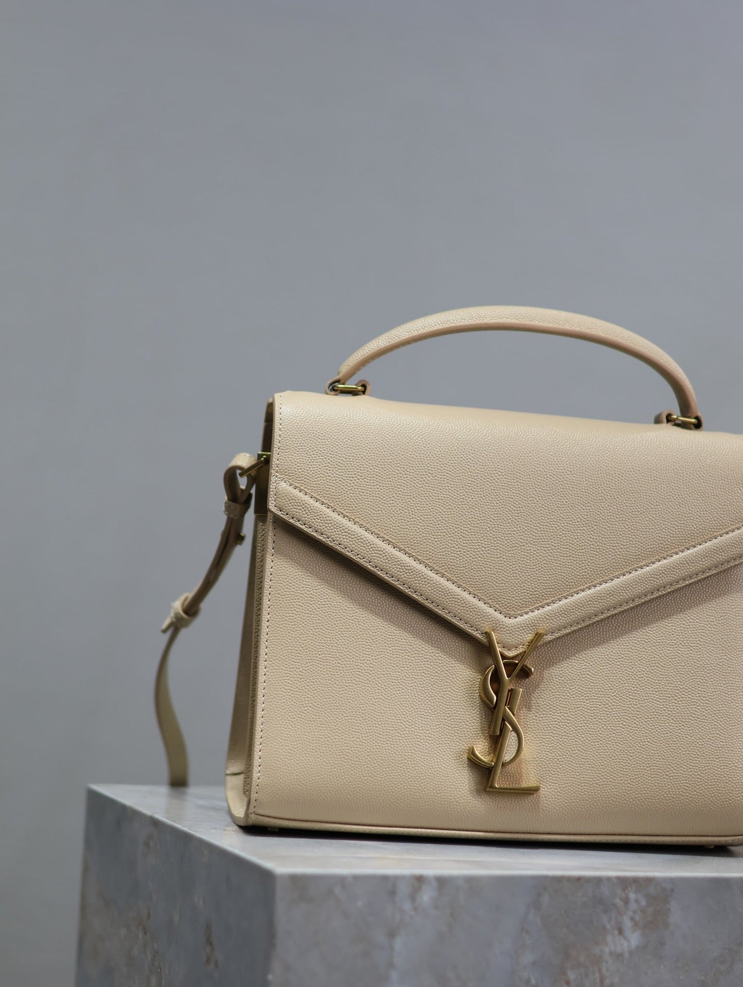 Luxury Saint Laurent CASSANDRA TOP HANDLE BAG 24 IN BEIGE CALFSKIN GOLD HARDWARE