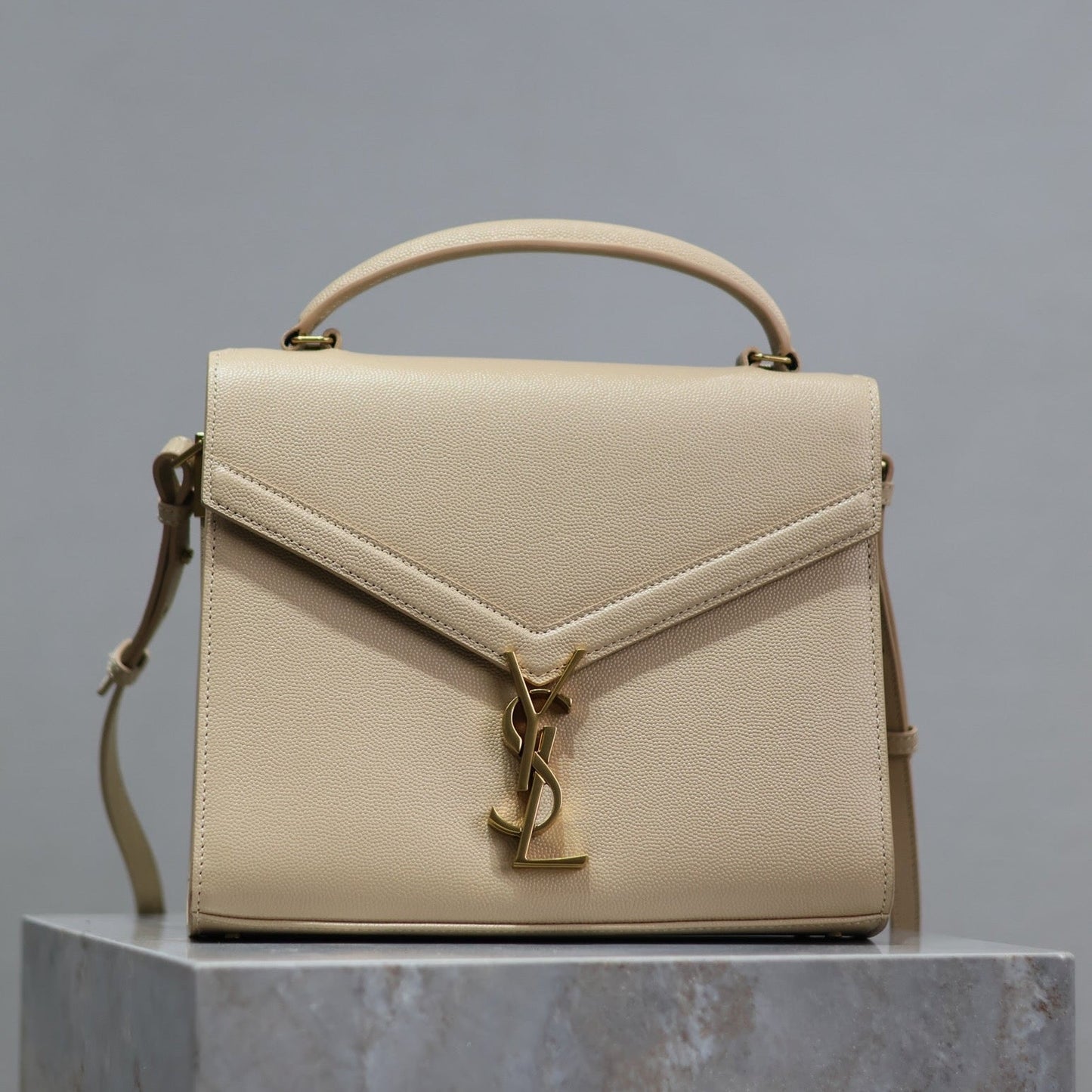 Luxury Saint Laurent CASSANDRA TOP HANDLE BAG 24 IN BEIGE CALFSKIN GOLD HARDWARE