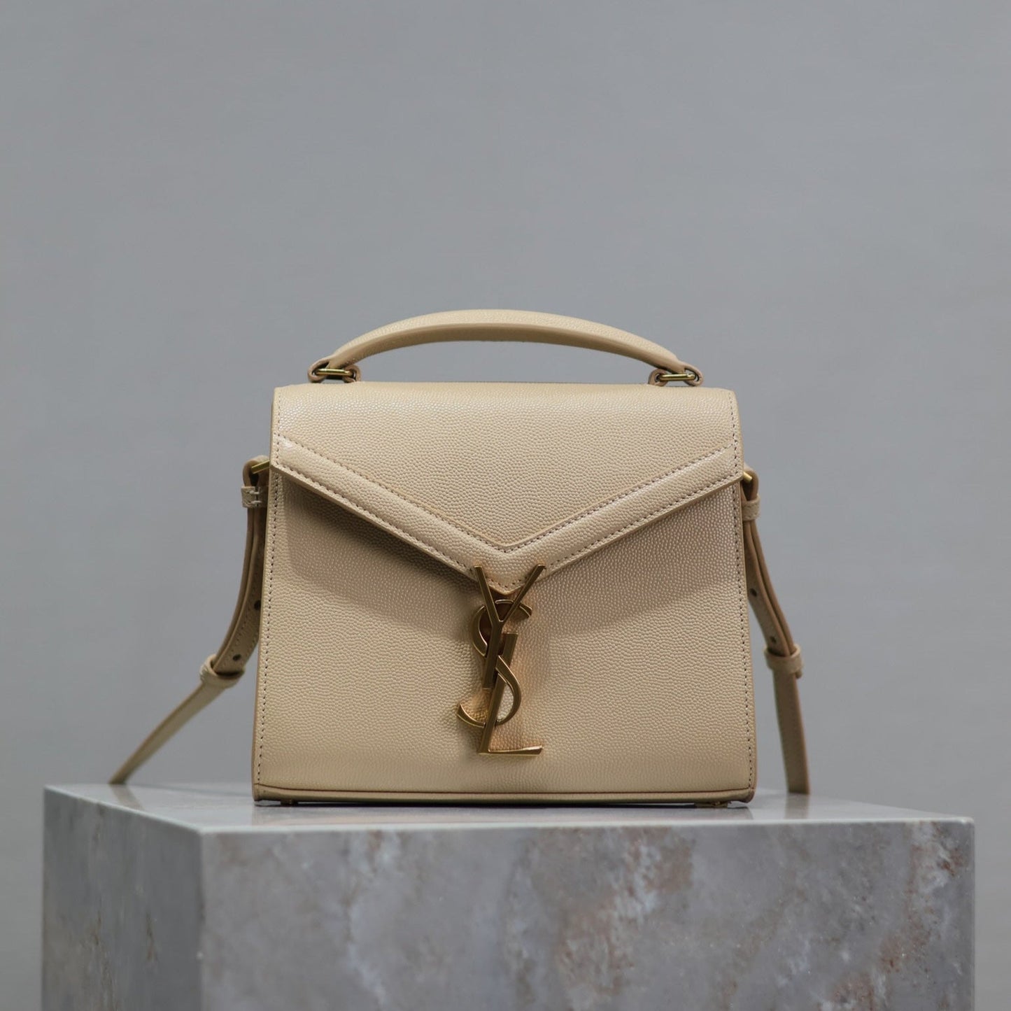 Luxury Saint Laurent CASSANDRA MINI TOP HANDLE BAG 20 IN BEIGE CALFSKIN GOLD HARDWARE