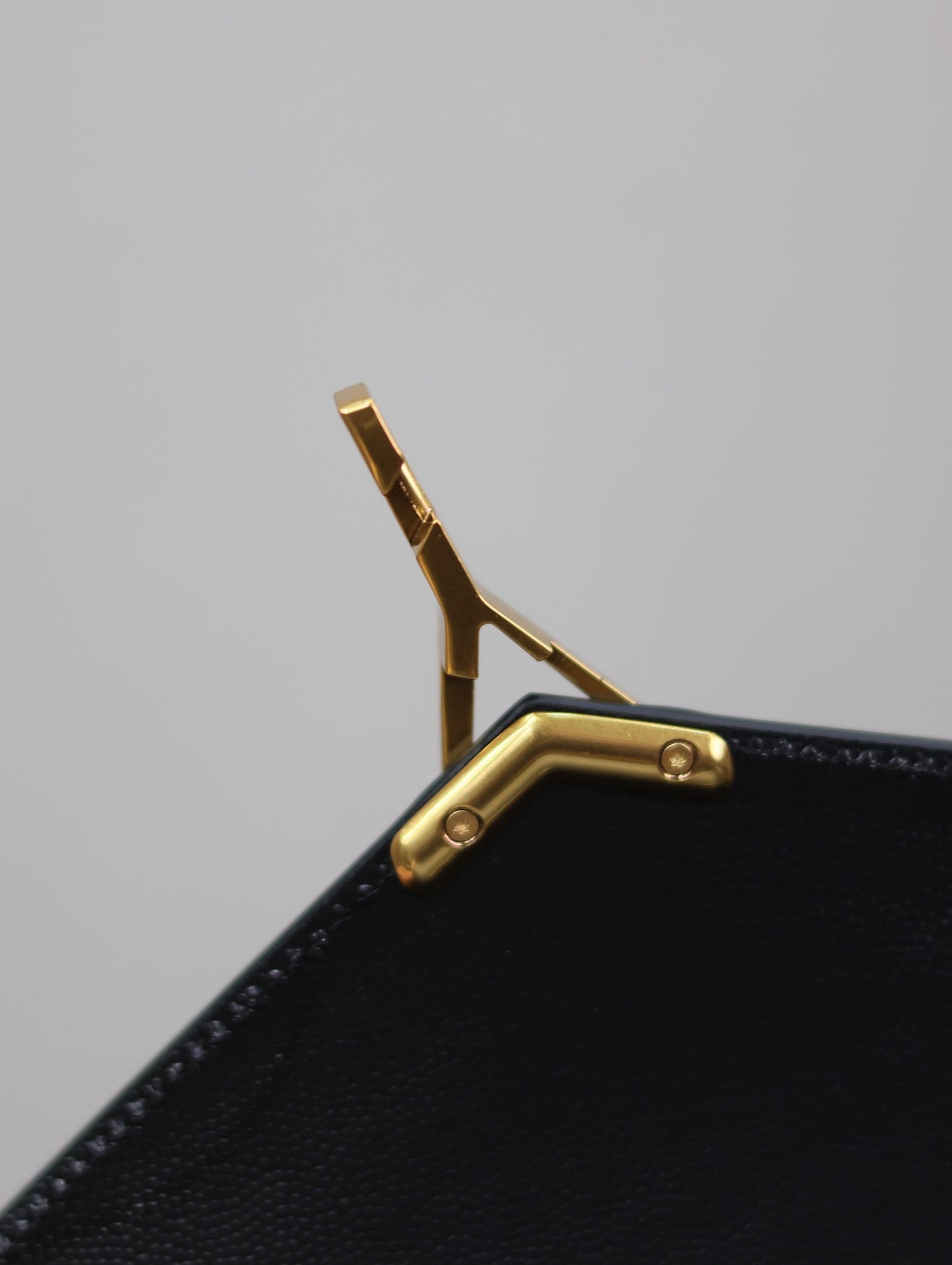 Luxury Saint Laurent CASSANDRA TOP HANDLE BAG 24 IN BLACK CALFSKIN GOLD HARDWARE