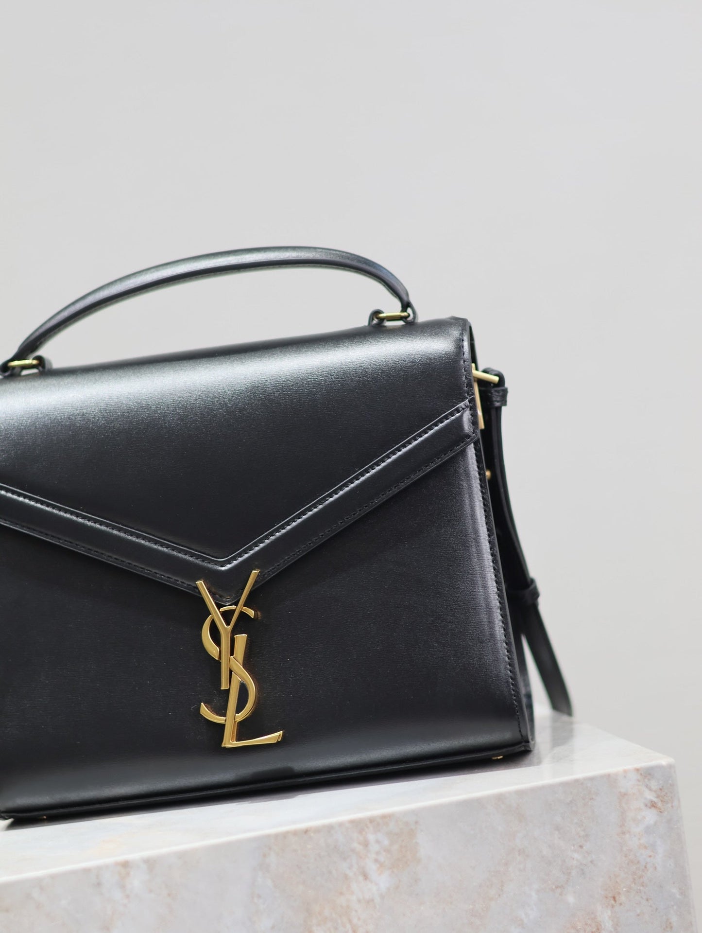 Luxury Saint Laurent CASSANDRA TOP HANDLE BAG 24 IN BLACK SMOOTH LAMBSKIN GOLD HARDWARE