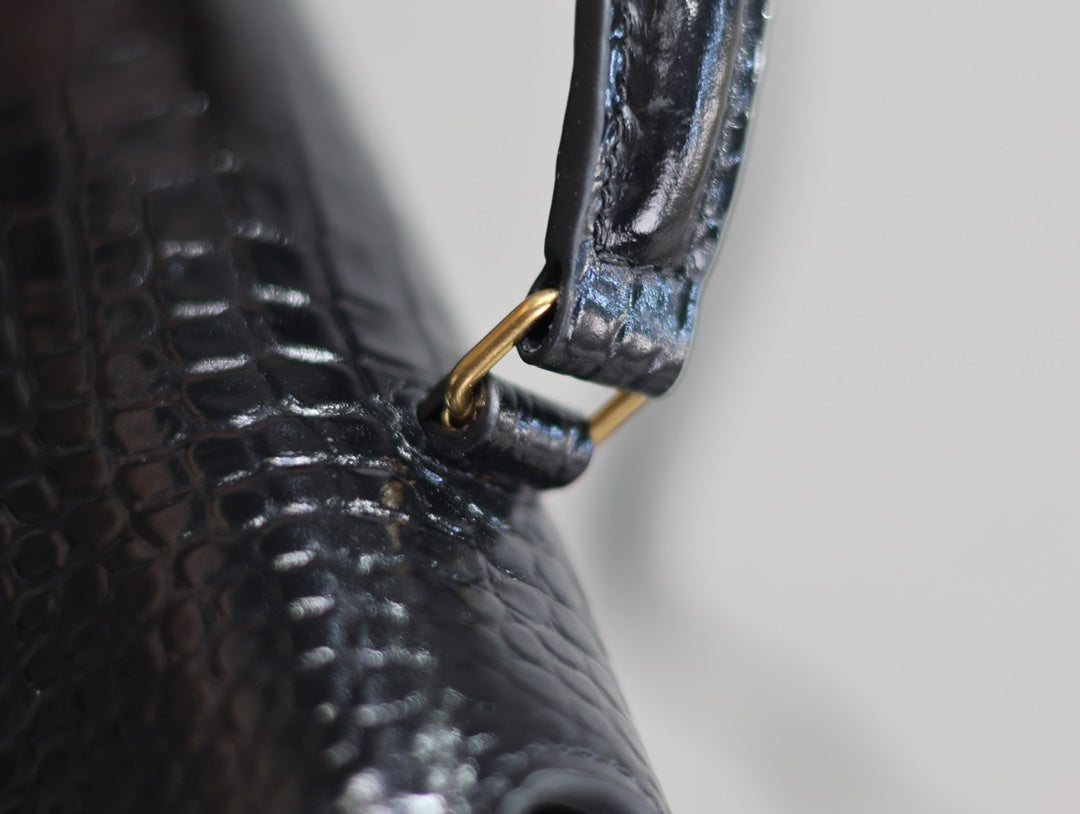 Luxury Saint Laurent CASSANDRA TOP HANDLE BAG 24 IN BLACK CROCODILE-EMBOSSED GLOSSY CALFSKIN