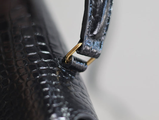 Luxury Saint Laurent CASSANDRA TOP HANDLE BAG 24 IN BLACK CROCODILE-EMBOSSED GLOSSY CALFSKIN