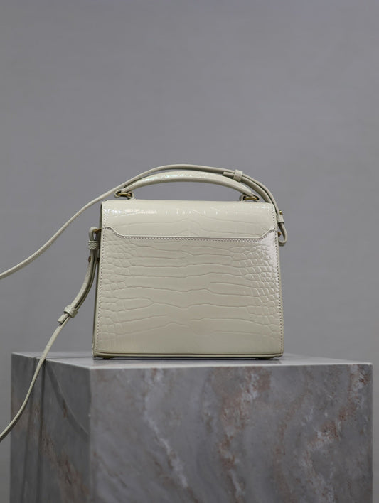 Luxury Saint Laurent CASSANDRA MINI TOP HANDLE BAG 20 IN WHITE CROCODILE-EMBOSSED GLOSSY CALFSKIN