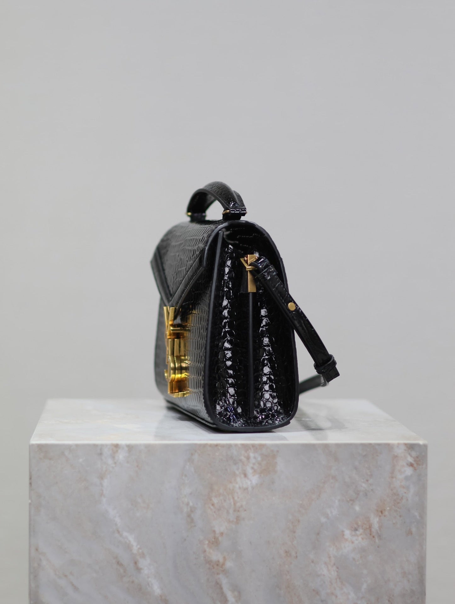 Luxury Saint Laurent CASSANDRA MINI TOP HANDLE BAG 20 IN BLACK CROCODILE-EMBOSSED GLOSSY CALFSKIN