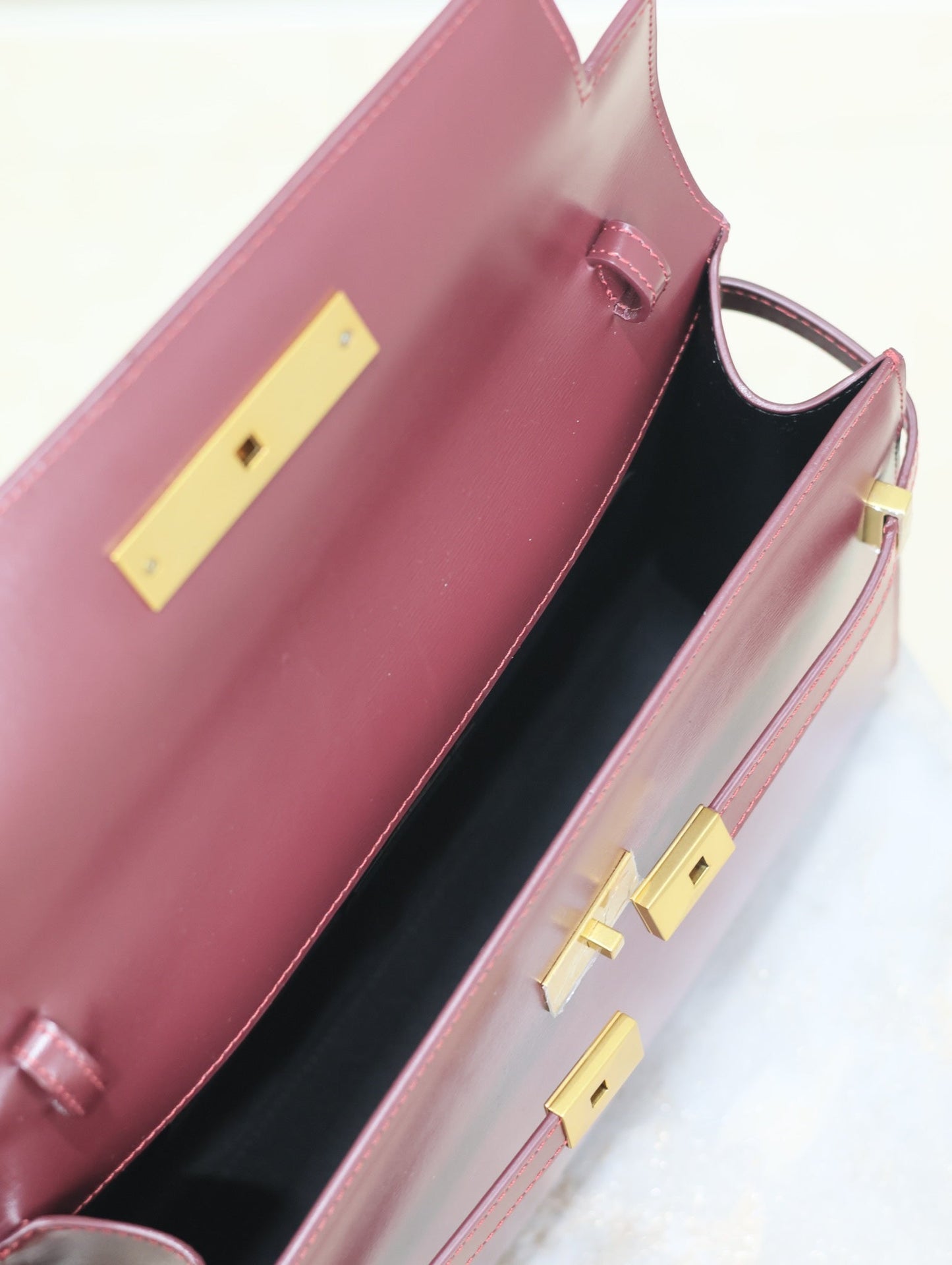 Luxury Saint Laurent MANHATTAN MEDIUM 29 IN WINE RED SMOOTH CALFSKIN GOLD BUCKLE