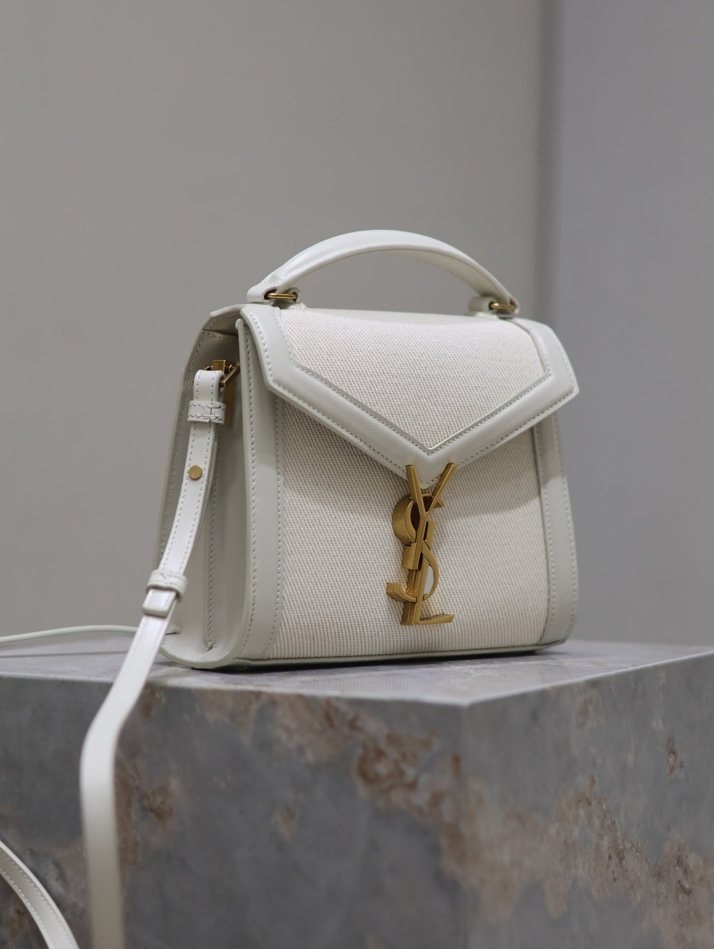 Luxury Saint Laurent CASSANDRA MINI TOP HANDLE BAG 20 IN WHITE CANVAS AND LEATHER TRIM