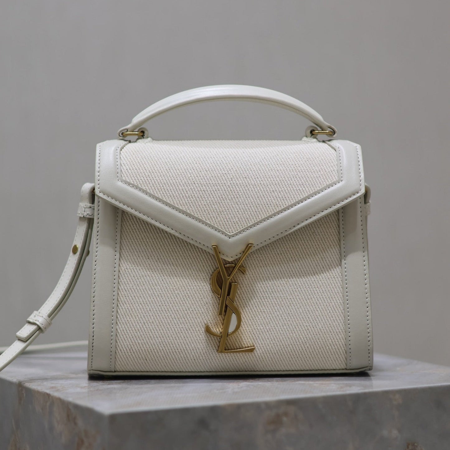 Luxury Saint Laurent CASSANDRA MINI TOP HANDLE BAG 20 IN WHITE CANVAS AND LEATHER TRIM