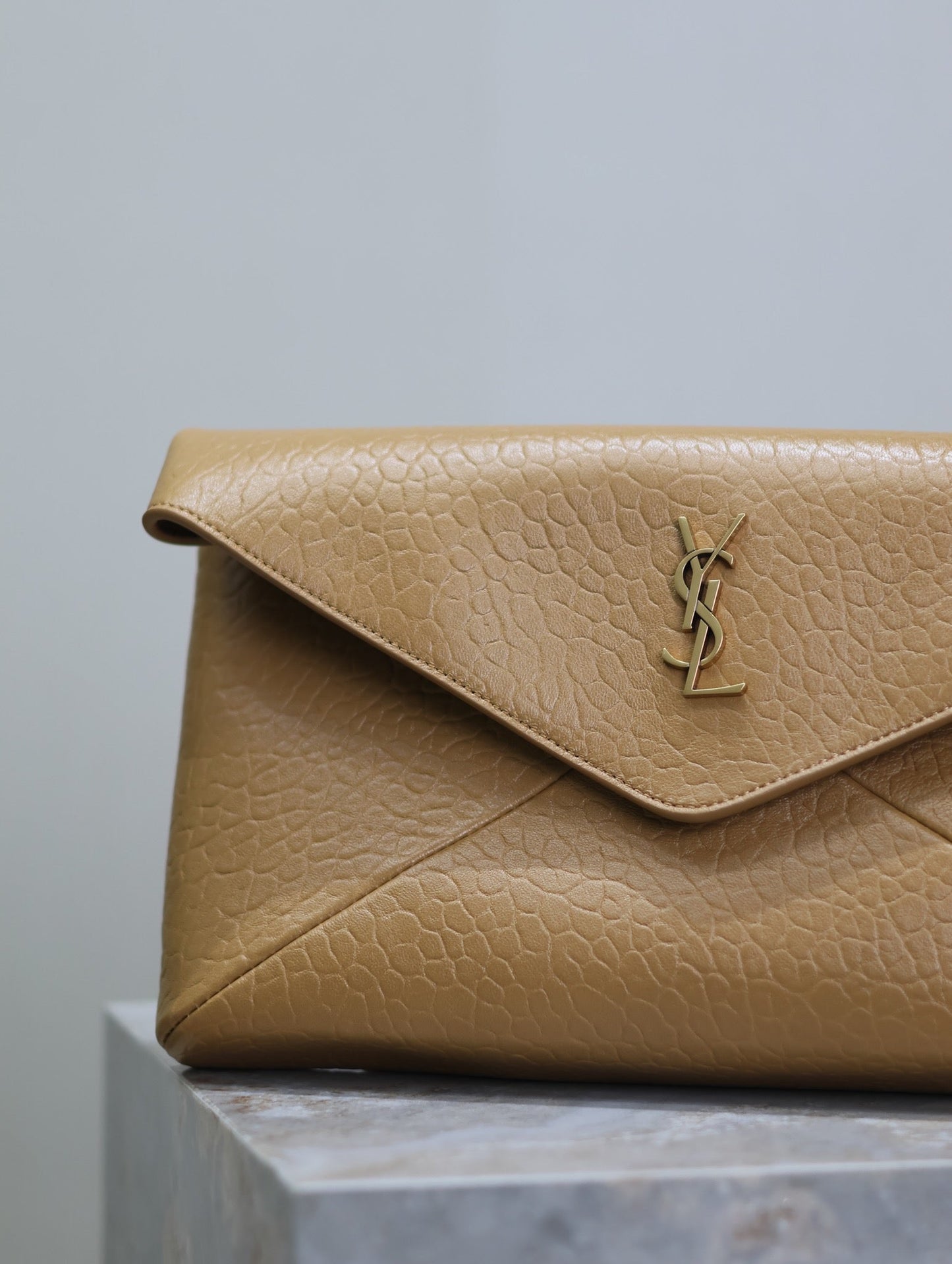 Luxury Saint Laurent ENVELOPE CLUTCH 29 IN EARTHY YELLOW LAMBSKIN COPPER LOGO