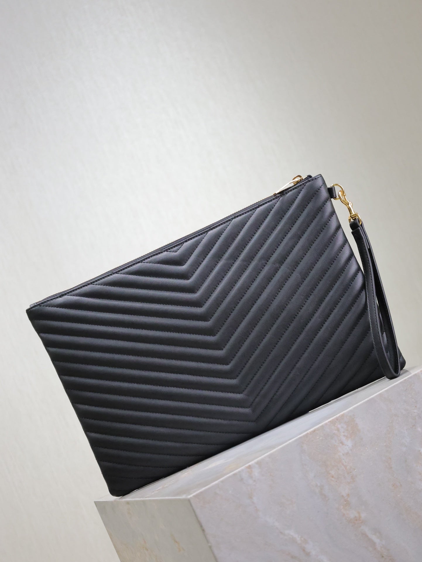 Luxury Saint Laurent CLUTCH 36 IN BLACK QUILTED CALFSKIN GOLD BUCKLE