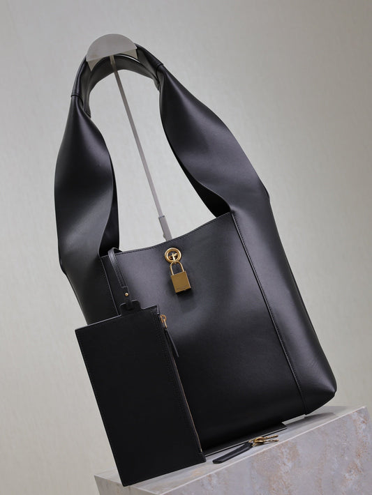 Luxury Saint Laurent TANGER HOBO BAG 27 IN BLACK CALFSKIN