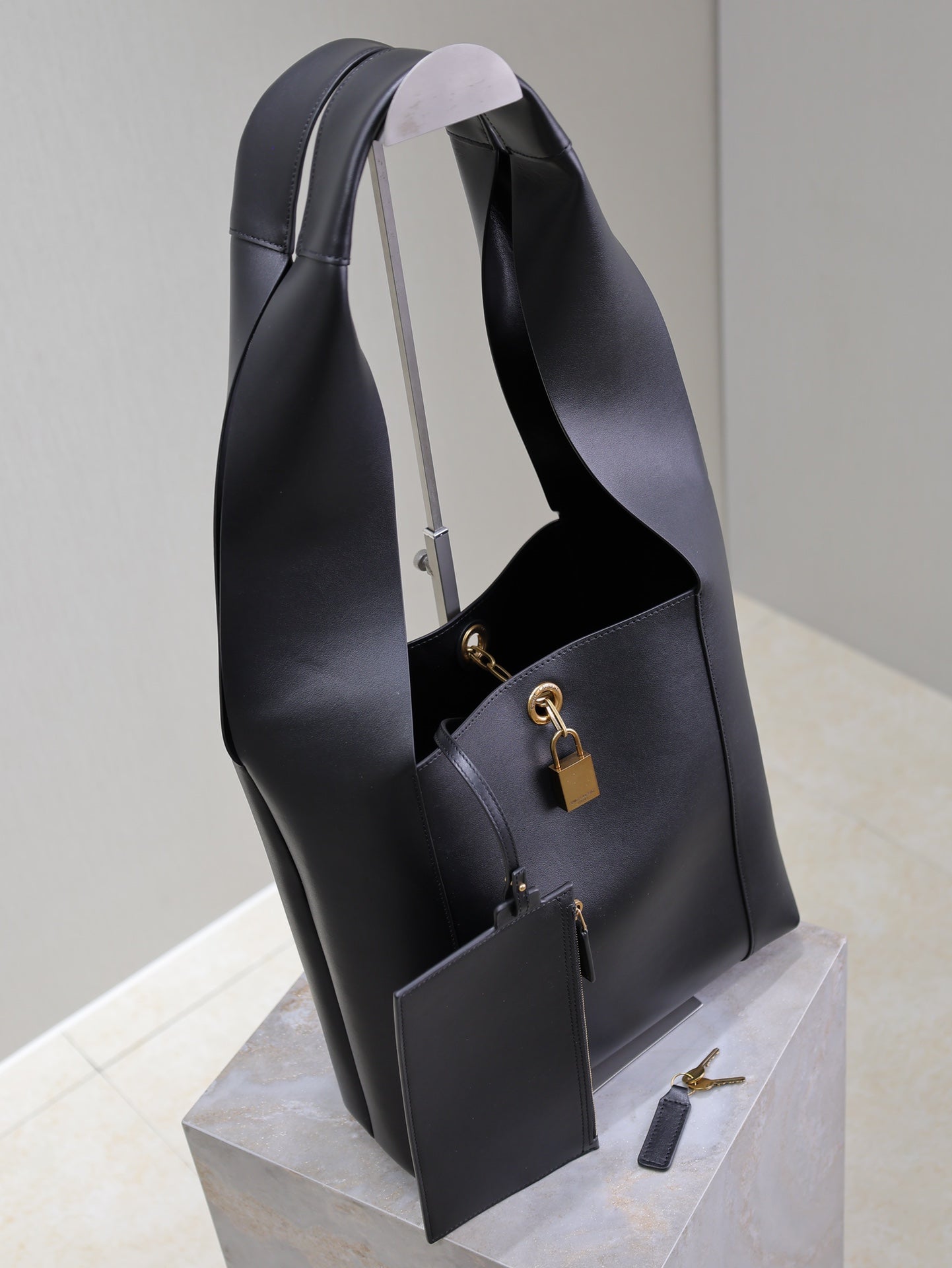 Luxury Saint Laurent TANGER HOBO BAG 27 IN BLACK CALFSKIN